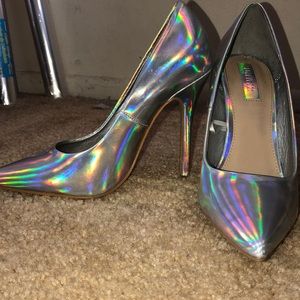 Holographic Pointed Heels